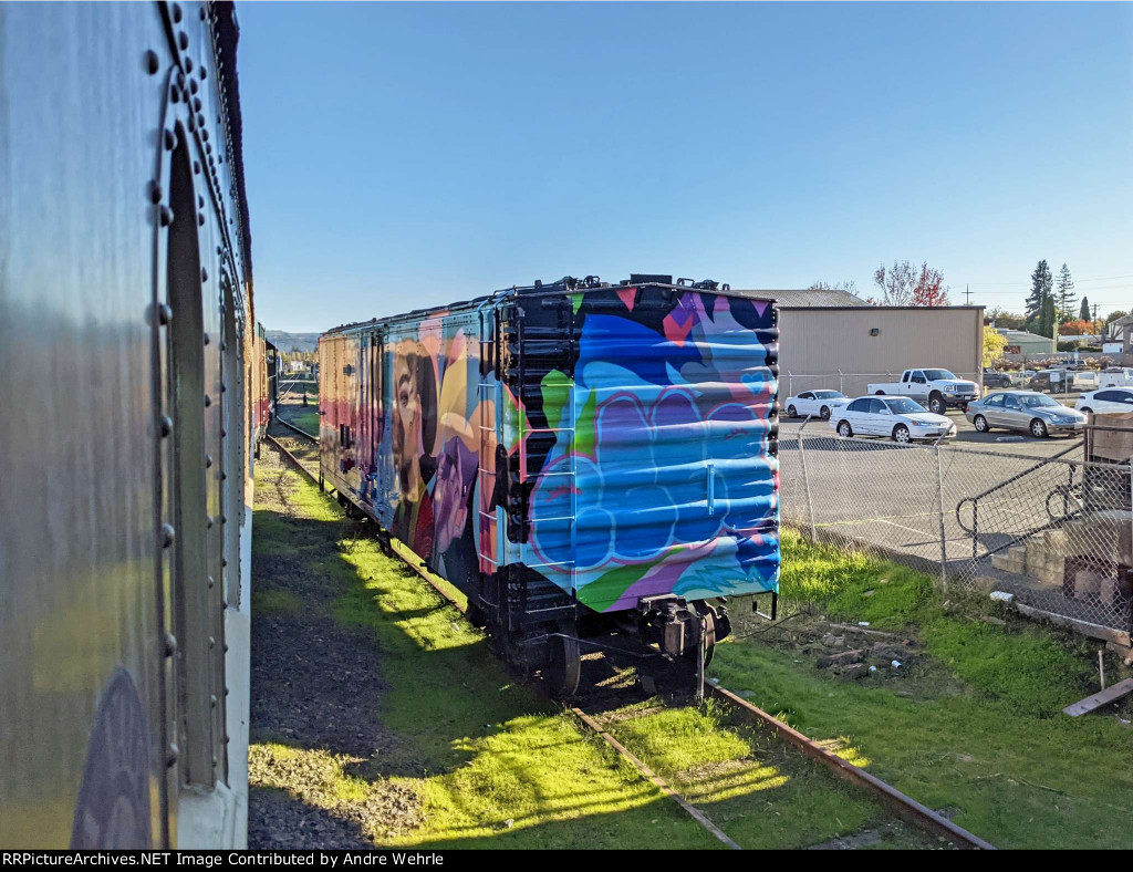 Colorful mural painted on an old boxcar